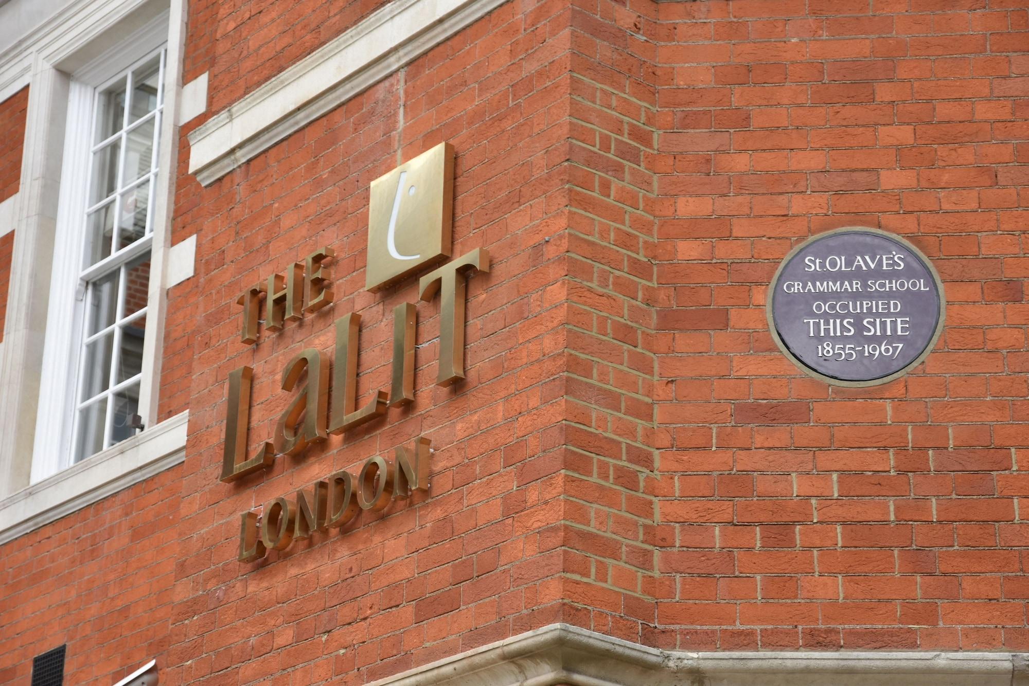 The Lalit London Hotell Exteriör bild The UCL logo and the commemorative plaque at the site of the former Soho slave school