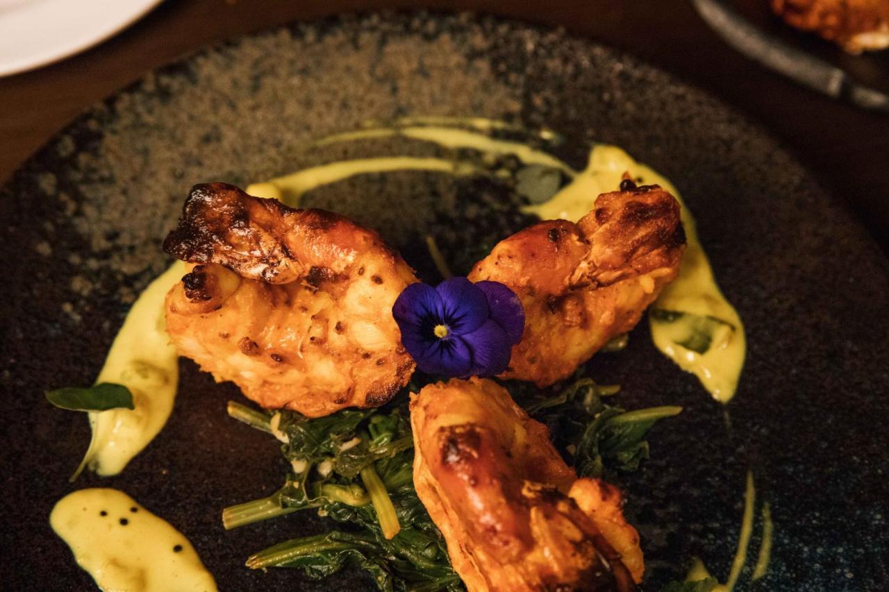 The Lalit London Hotell Exteriör bild A prawn starter at the restaurant